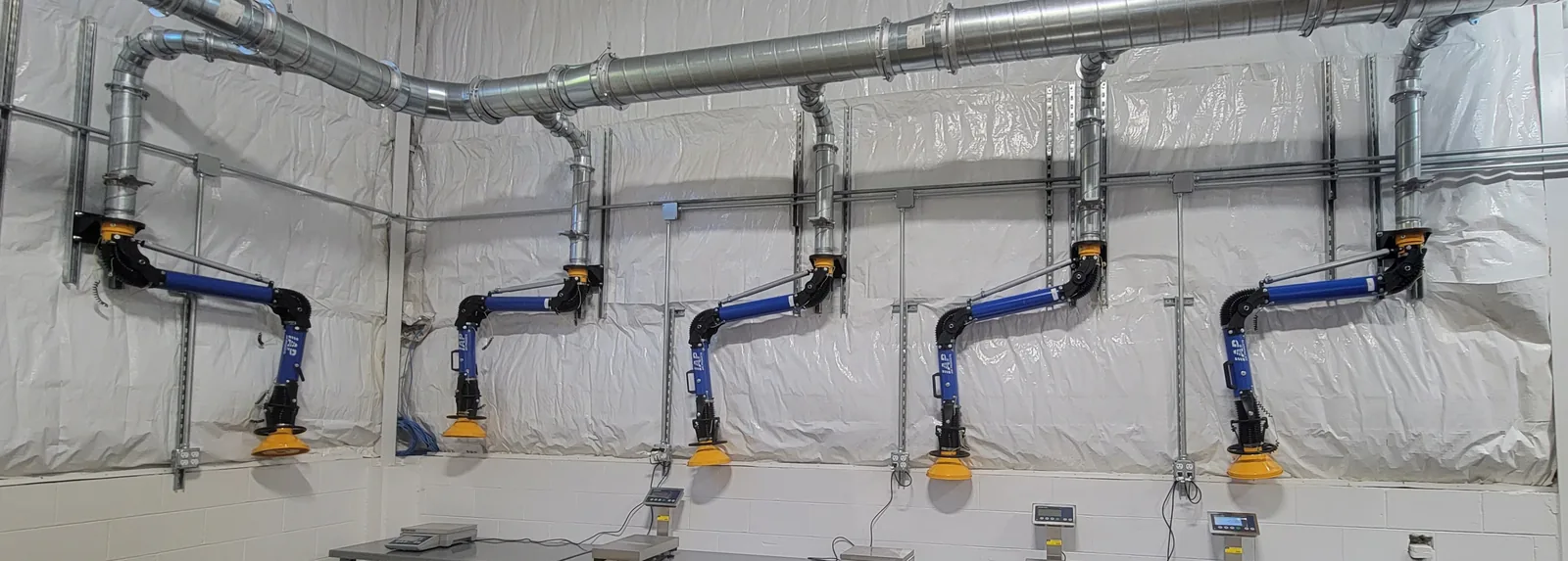 Fume extraction swing arms